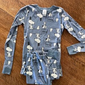 Hannah Andersson Peanuts Snoopy Halloween themed two-piece pajama set.
